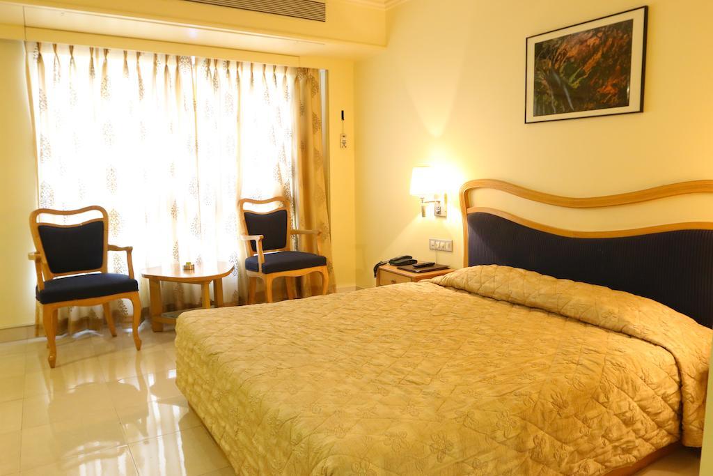 Hotel Ambassador Pune Quarto foto