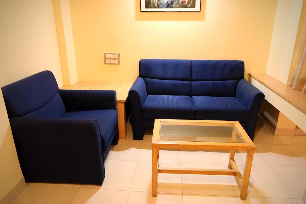 Hotel Ambassador Pune Quarto foto
